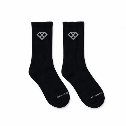 Pair of black crew socks arranged side by side at the same scale and framing as the white sock reference